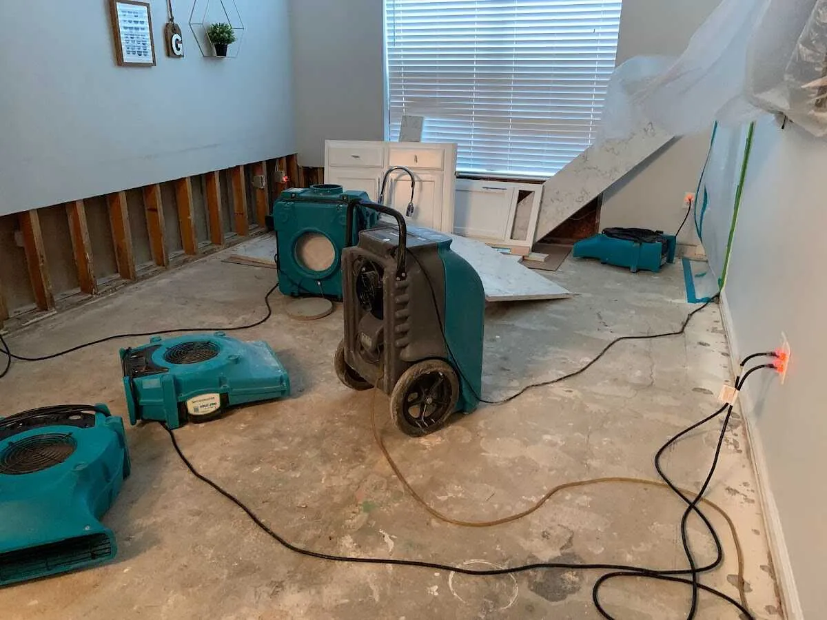 Dehumidifier in flood-cut room for Water Damage Restoration in Logansport